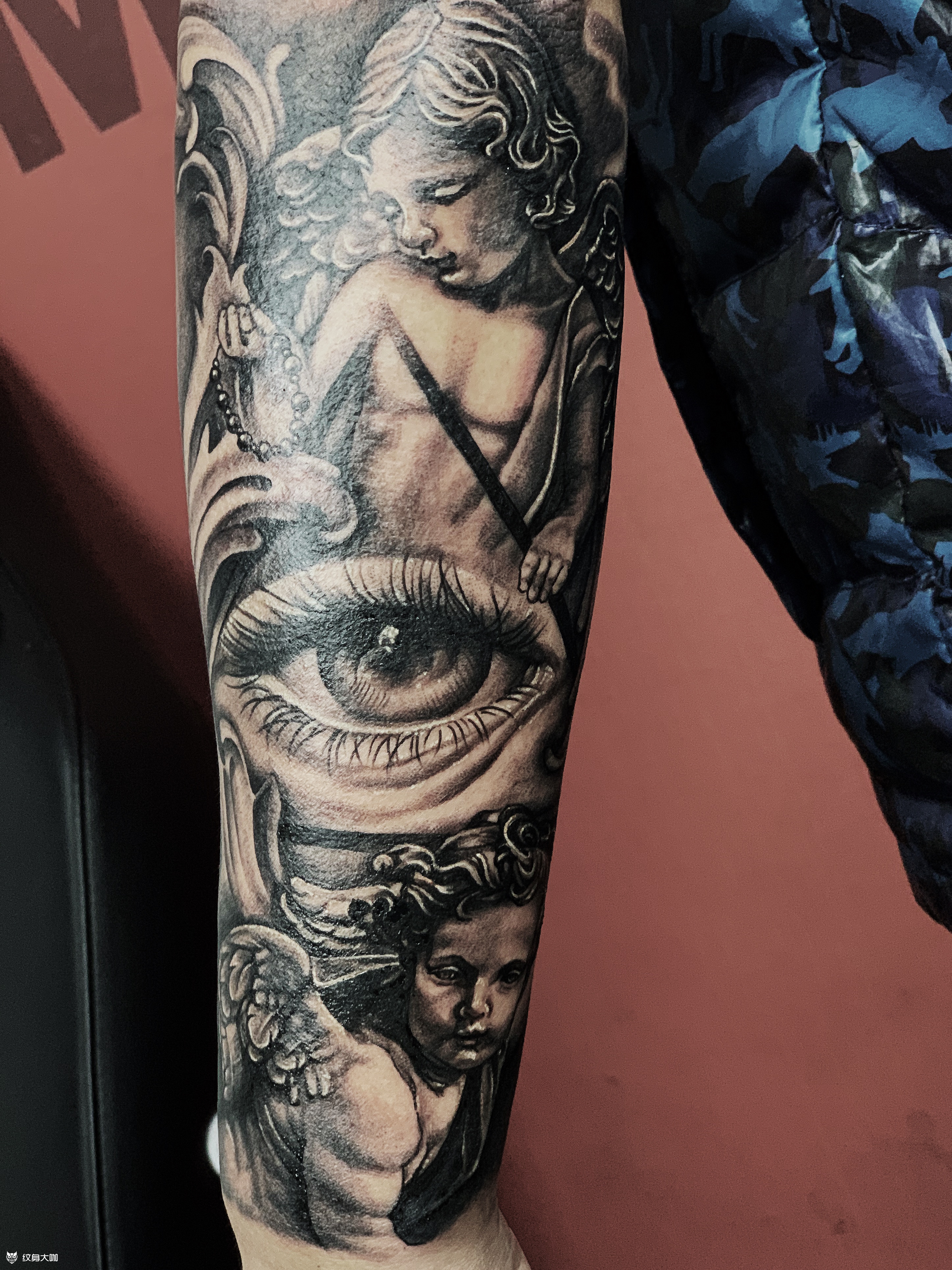 欧美花臂天使眼睛