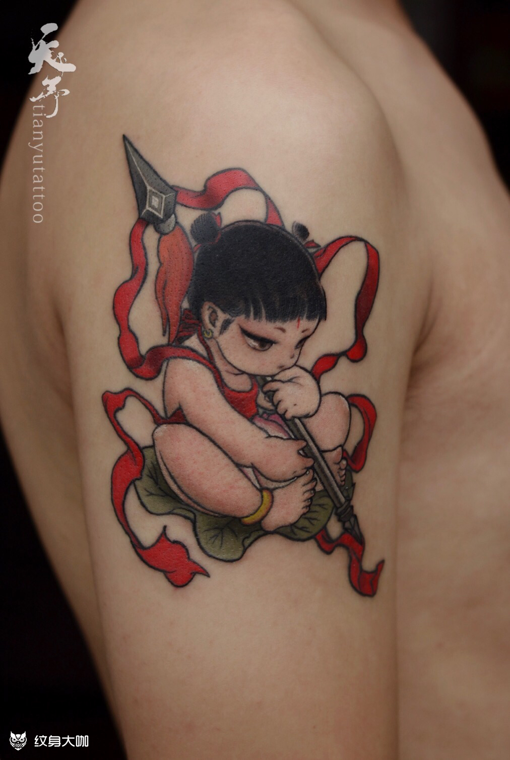 作品简介:小哪吒 顾客是痛仰乐队的粉丝,结合顾客儿子设计的哪吒纹身.