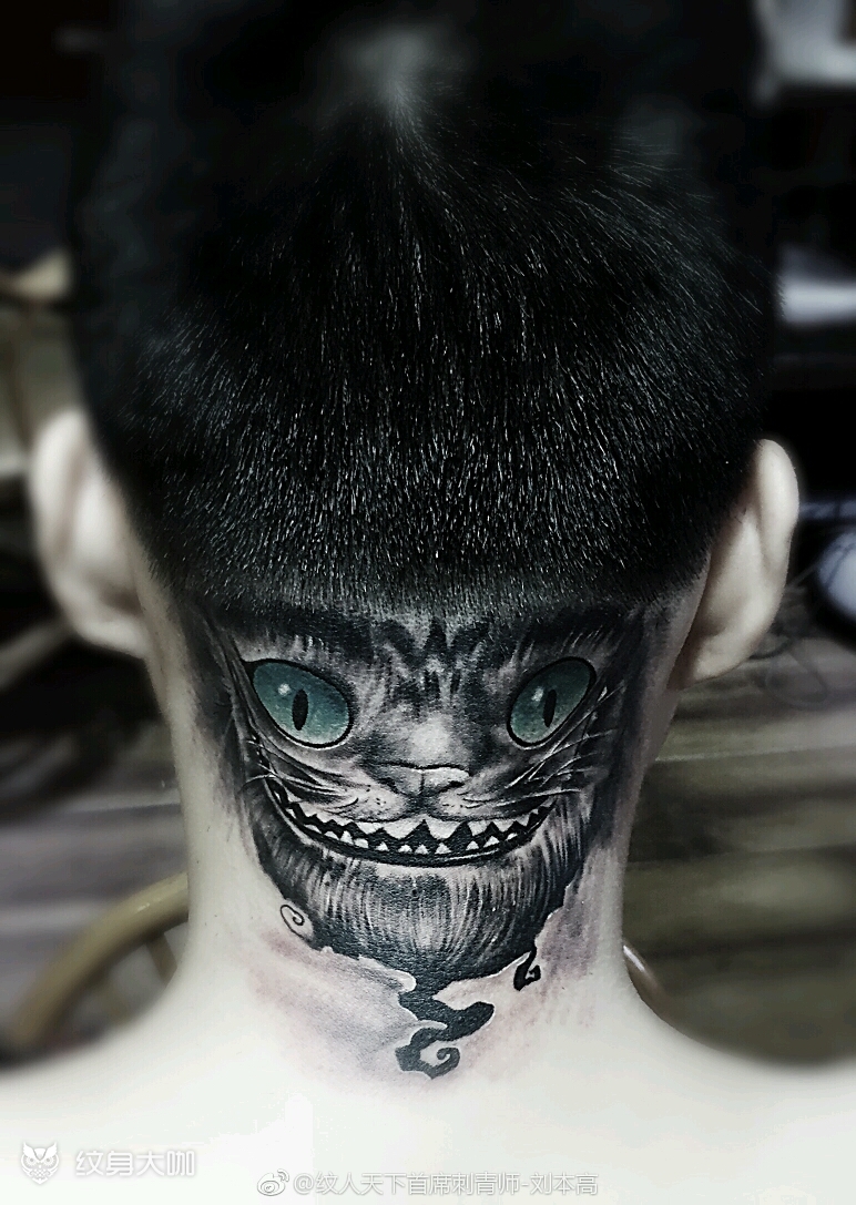 柴郡猫的露齿笑纹身图片