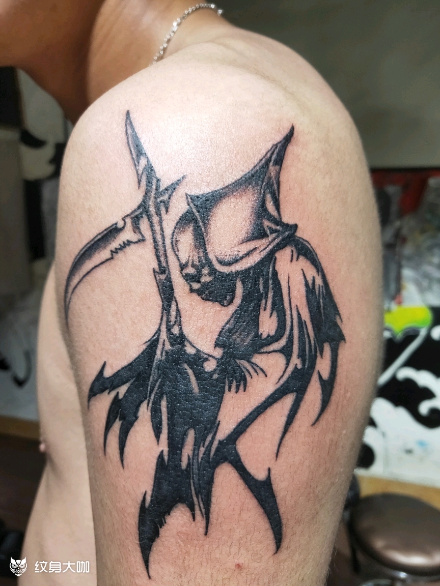 拿镰刀的麦客子