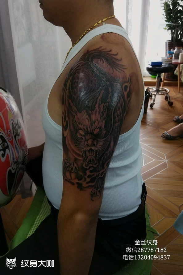 手绘图纹身谛听