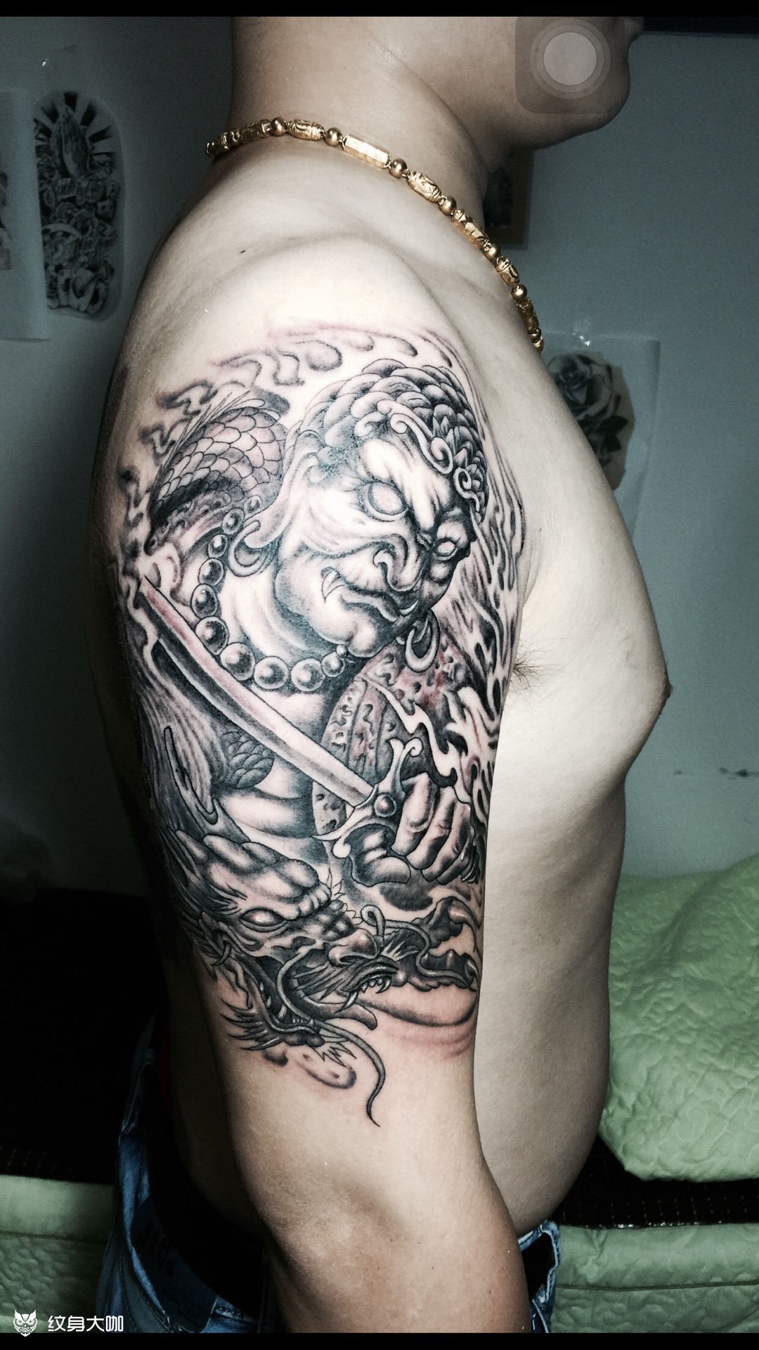 大臂不动明王纹身