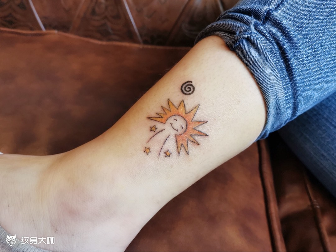 太阳纹身的禁忌 腿部图片
