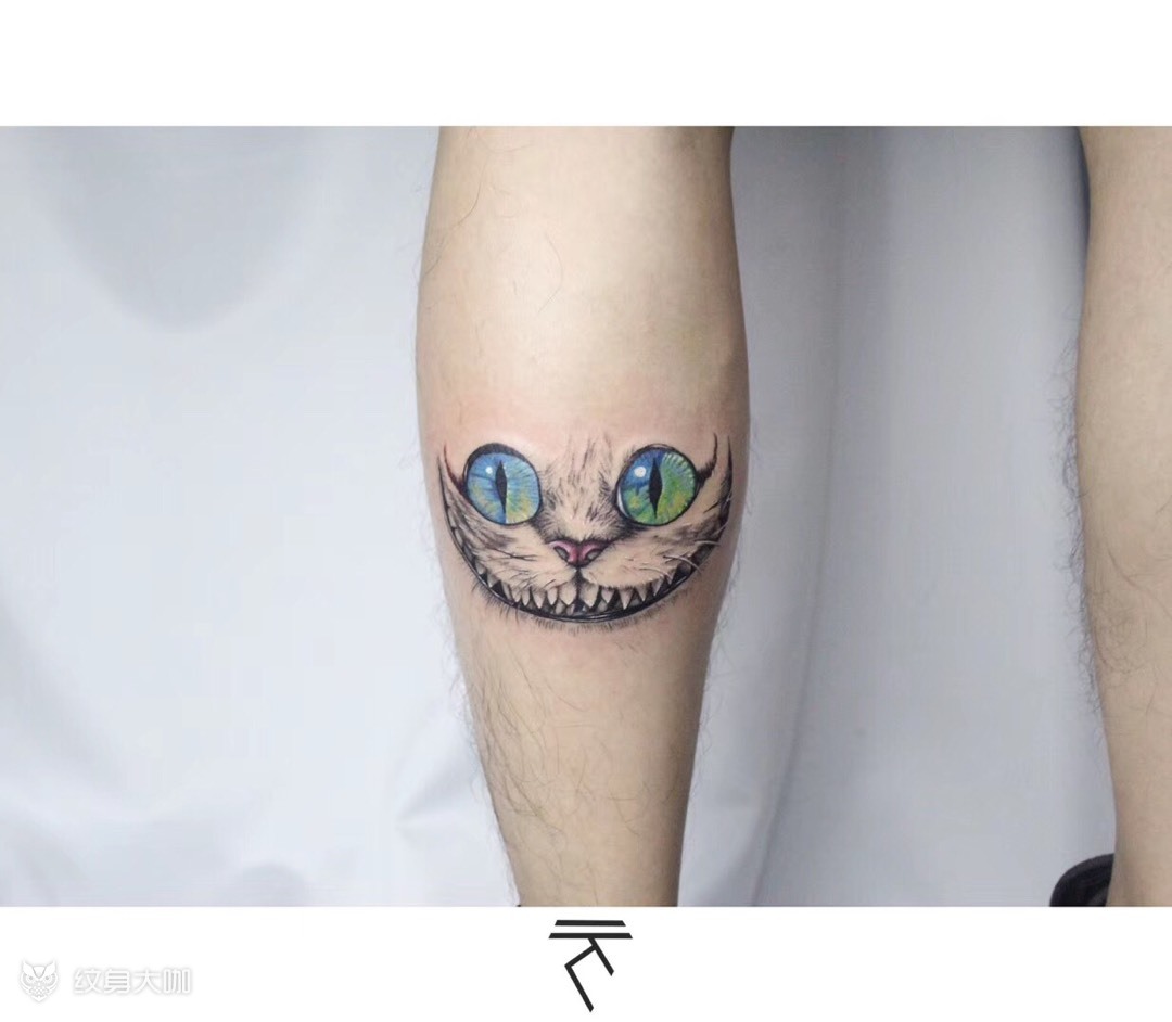 柴郡猫的露齿笑纹身图片